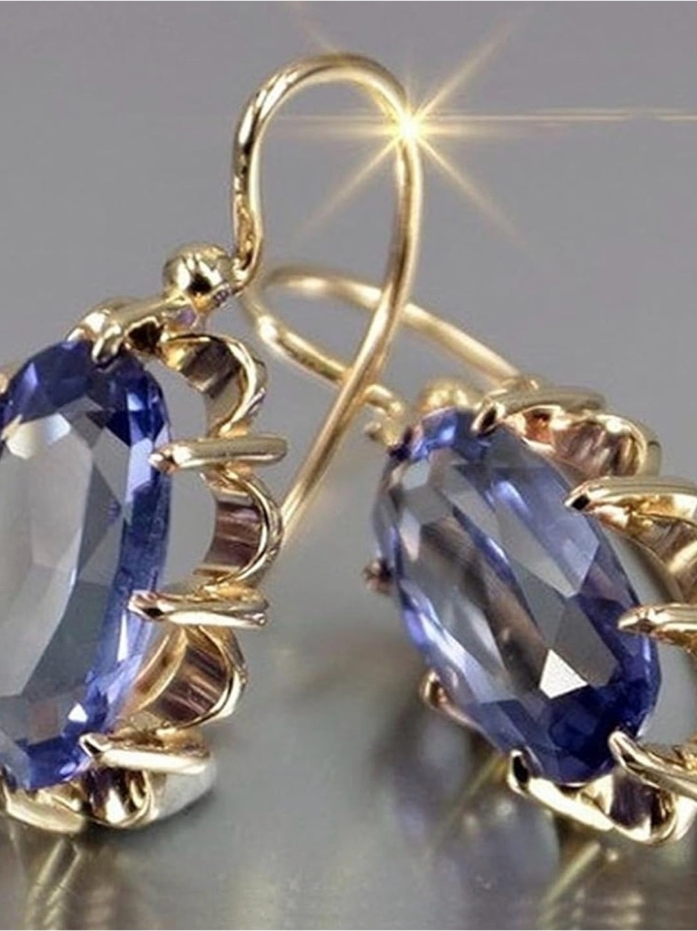 Gold Drop Earrings with Violet-Blue Oval Gemstones.